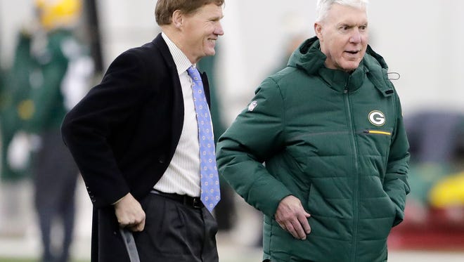 Green Bay Packers President and CEO Mark Murphy (left) talks with GM Ted Thompson during the team's practice at the Don Hutson Center on Dec. 20, 2017.