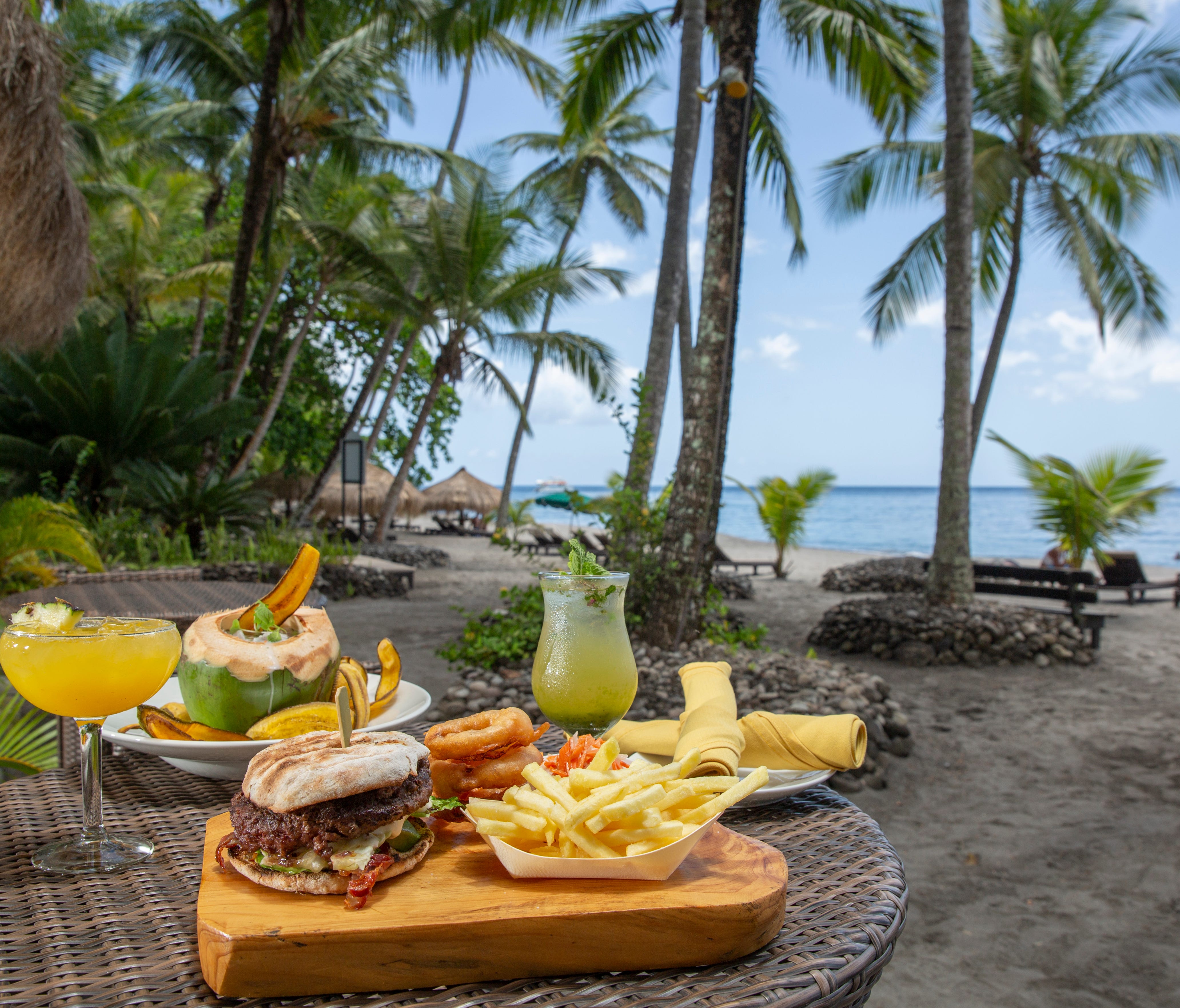 At the Jungle Grill in St. Lucia, minty mojitos and burgers are the star attractions.