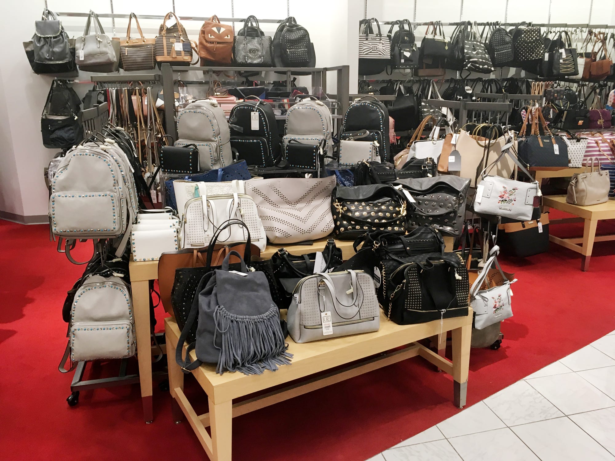 Designer handbag outlet discount stores