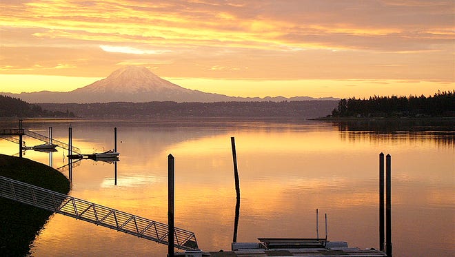 Morning Light  |  Gig Harbor resident Ken Rosholt captured the early morning light from a vantage point on the Fox Island bridge recently, looking east toward Mount Rainier. Do you have a photo of life in Gig Harbor that you’d like to share with your friends and neighbors in the pages of Gig Harbor Life? Send a high-resolution jpg image (minimum 200 dpi at 8 inches across) to editor@gigharbor-life.com. Be sure to include a brief description of where and when it was taken along with the photographer’s name.