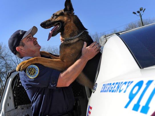 Police dog killed by robber inspires new law