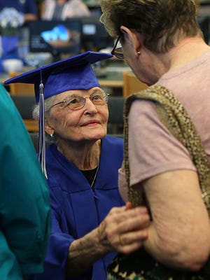 San Angelo resident Betty Jo Griffin, 90, greets a woman after accepting an honorary high school diploma from San Angelo ISD's Lake View High School Monday, May 14, 2018. 
