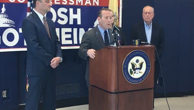 Rep. Josh Gottheimer speaks at the Northvale Public School on Monday about lead in drinking water. With him are Northvale Mayor Ed Piehler, left, and Sierra Club representative Hugh Evans.