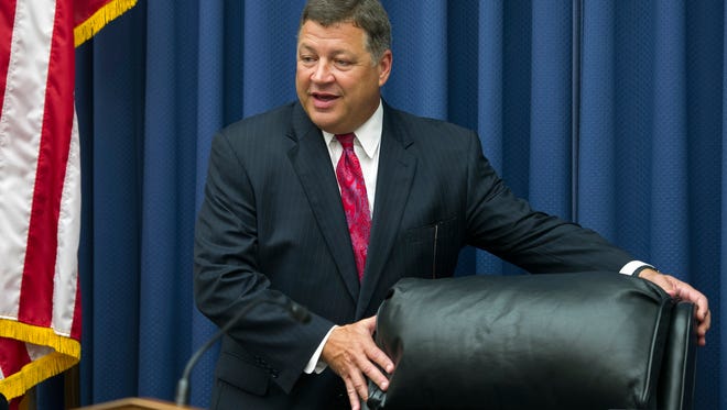 In this June 2, 2015 file photo, House Transportation and Infrastructure Committee Chairman Bill Shuster, R-Pa., takes his seat on Capitol Hill in Washington.