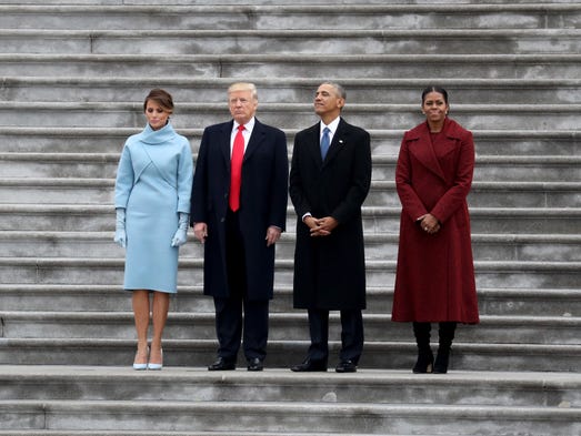 The Trumps and Obamas  stand on the steps of the  U.S.
