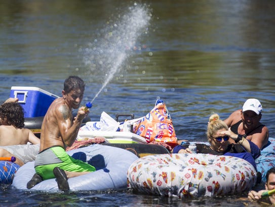 Rafters ride inner tubes on the Lower Salt River in