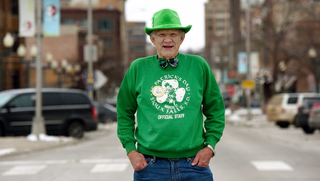 Larry Fuller poses for a portrait along Phillips Ave. and 13th St. in downtown Sioux Falls on Wednesday. Fuller is the grand marshal for the 38th annual St. Patrick's Day Parade.