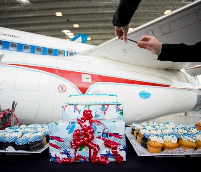 Gifts and cupcakes line a table in front of the first Boeing 737, which celebrates 50 years since first flight on April 9, 2017. The party took place at Seattle's Museum of Flight.