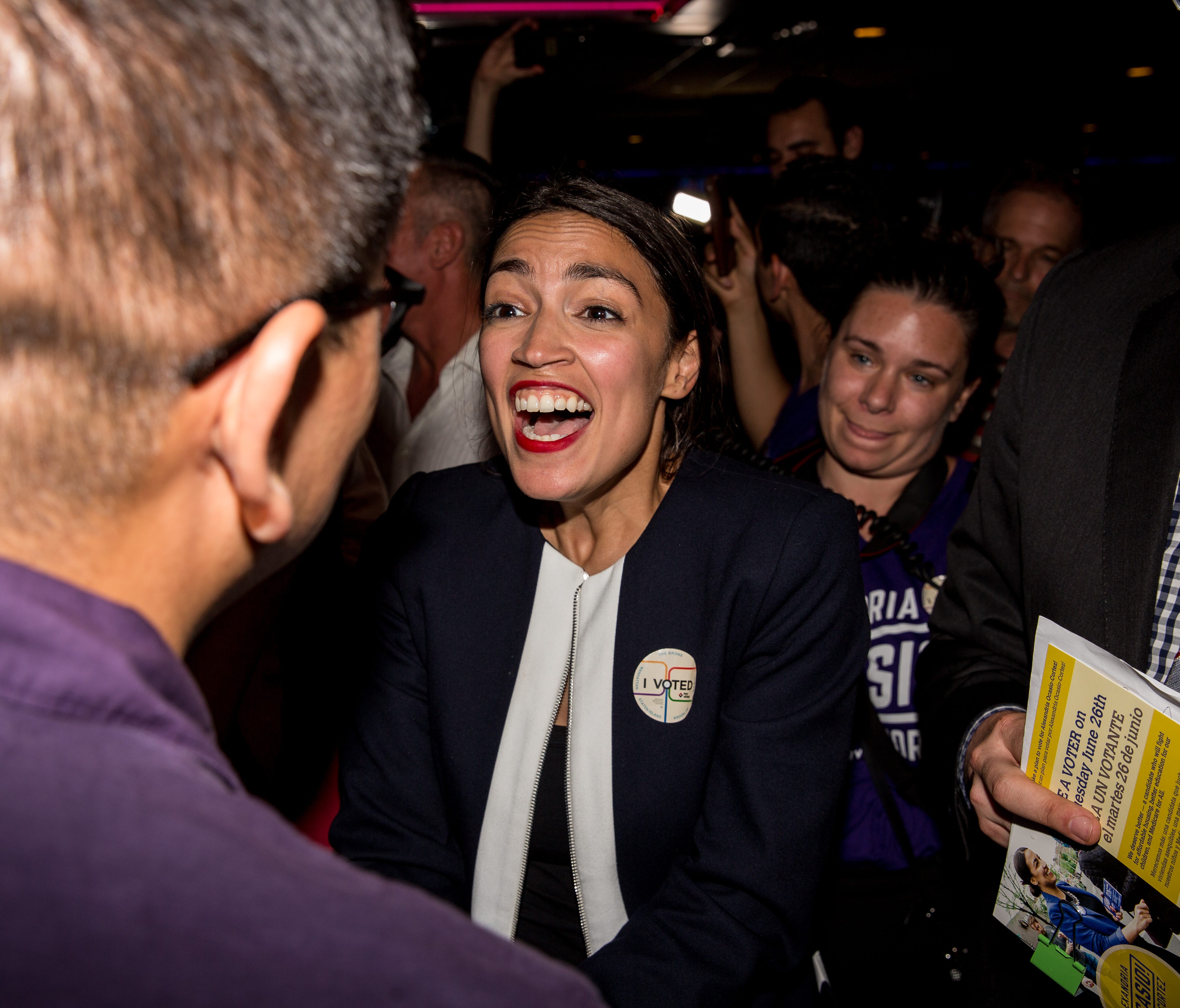 Progressive challenger Alexandria Ocasio-Cortez celebrartes with supporters at a victory party in the Bronx after upsetting incumbent Democratic Representative Joseph Crowly on June 26, 2018 in New York City.  Ocasio-Cortez upset Rep. Joseph Crowley 