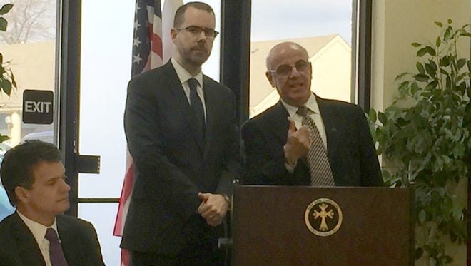 U.S. Rep. Dave Trott, R-Michigan, Knox Thames, the U.S. State Department's special adviser for religious minorities in the Middle East and south and central Asia, and Joseph Kassab, president of the Iraqi Christians Advocacy and Empowerment Institute, at the Institute's office in West Bloomfield, on March 18, 2016