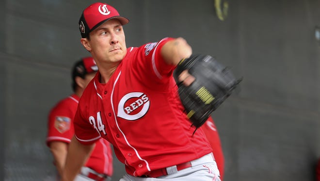 Cincinnati Reds starting pitcher Homer Bailey (34) delivers in the bullpen, Sunday, Feb. 18, 2018, at the Cincinnati Reds Spring Training facility in Goodyear, Arizona.