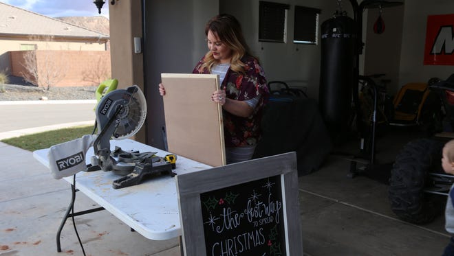 Nakelle Prisbrey, a Washington City resident who owns businesses that run out of her own home, makes custom-made decorative chalkboards for people's homes.