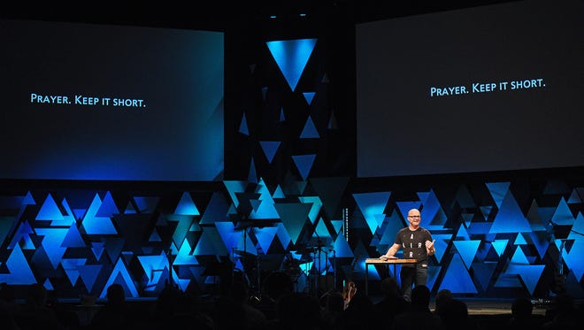 Adam Weber, lead pastor at Embrace Church, speaks during a service at Embrace Church Sunday, March 12, 2017, at the 57th Street campus in Sioux Falls. 