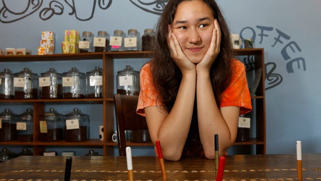 Wilson Jr. High School student Nylene Zabel, 14, poses for a photo at Jenn's Java on Friday, June 17. Nylene would be traveling to New York City and singing at Carnegie Hall on June 25. 