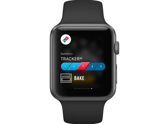 A smartwatch displaying Domino's app