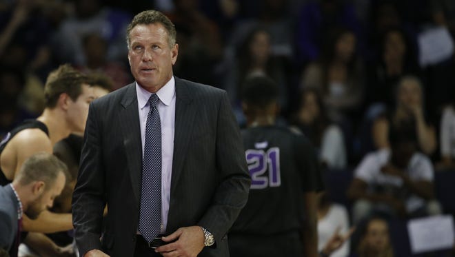 GCU's head coach Dan Majerle looks up at the scoreboard with his team down against San Diego during the first half at Grand Canyon University on Saturday, November 25, 2017 in Phoenix, Ariz.