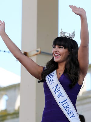Miss New Jersey Brenna Weick, a Mantua native,  waves as she is introduced during Miss America Pageant arrival ceremonies Tuesday in Atlantic City. The contestants
