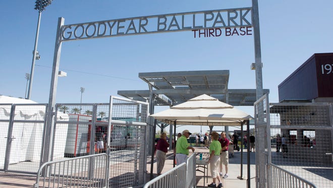 Fans go to watch the Cleveland Indians and Cincinnati Reds game at Goodyear Ballpark in Goodyear on March 7, 2014.