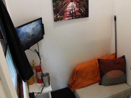 The living room is tight in Luke Thill's 89-square-foot