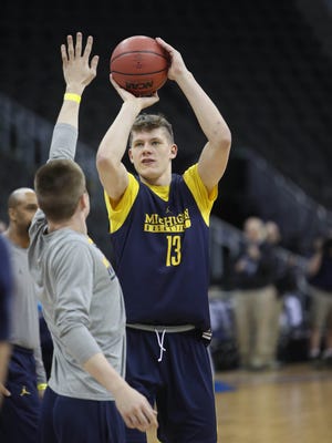 Michigan forward Moe Wagner goes through drills during practice at the NCAA Midwest Regional on Wednesday, March 22, 2017, at the Sprint Center in Kansas City, Mo.