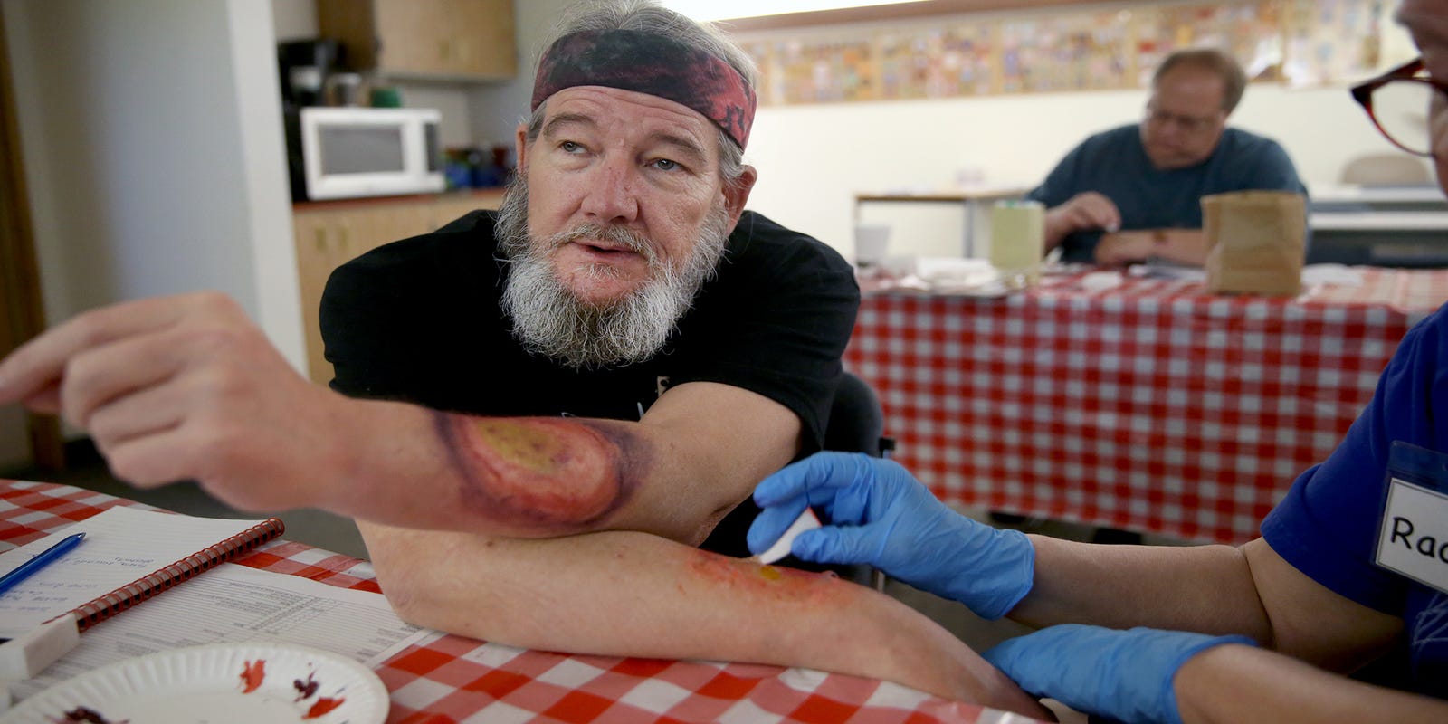 Make-up artists create gory mock injuries for emergency training Make-up artists create gory mock injuries for emergency training