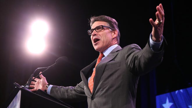 Texas Gov. Rick Perry speaks during the Freedom Summit on Saturday at Hoyt Sherman Place in Des Moines, Iowa.