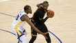 LeBron James is defended by Kevin Durant during the