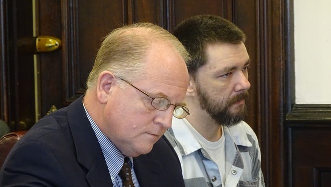 Andrew C. Edmonds, right, of Coshocton, will serve three years in prison in the death of his mother. Authorities say Edmonds found his mother dead in the home they shared last year, then stored her body in a pantry for three months to continue collecting her Social Security disability benefits. Public Defender Jeff Mullen, left, represented Edmonds on his charges in Coshocton County Common Pleas Court Tuesday.