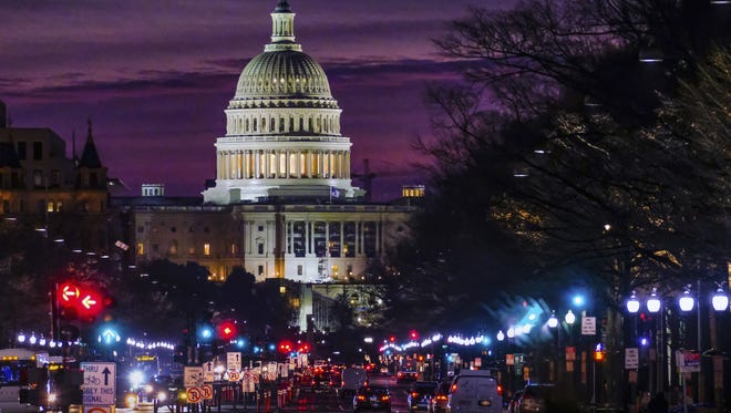 The 115th Congress returns to Washington on Tuesday, when Republicans will be in control of the House and Senate.
Early morning traffic rolls toward the U.S. Capitol on Dec. 14, 2016.