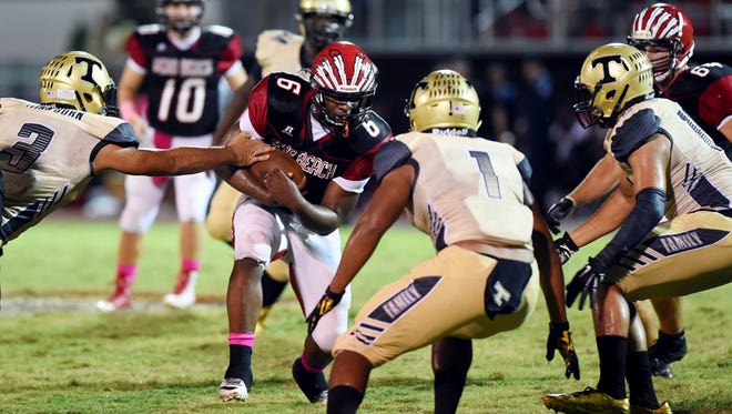 Vero Beach and Treasure Coast will meet in the Region 2-8A semifinal Friday. The Fighting Indians beat the the Titans 35-14 in their first meeting Oct. 14.