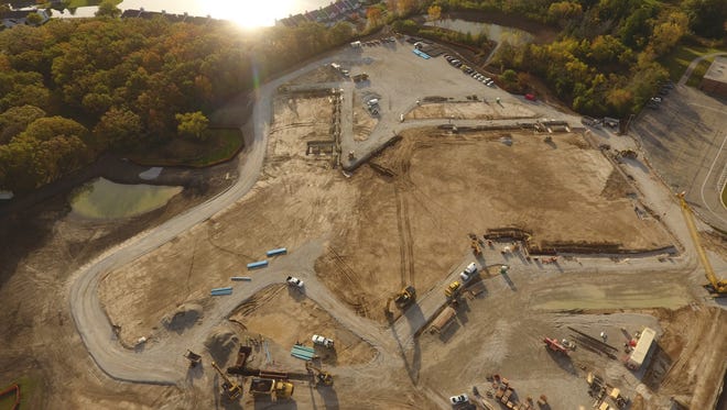 From the sky, the outline of the new Forest Park Middle School is visible, showing the two classroom wings off to the left and an area for the cafeteria, gym, and music classrooms off to the right.