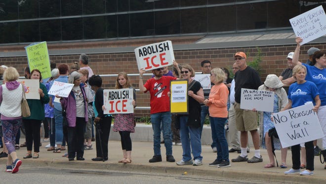 More than 200 people participated in an immigration policy protest in Battle Creek on June 20.