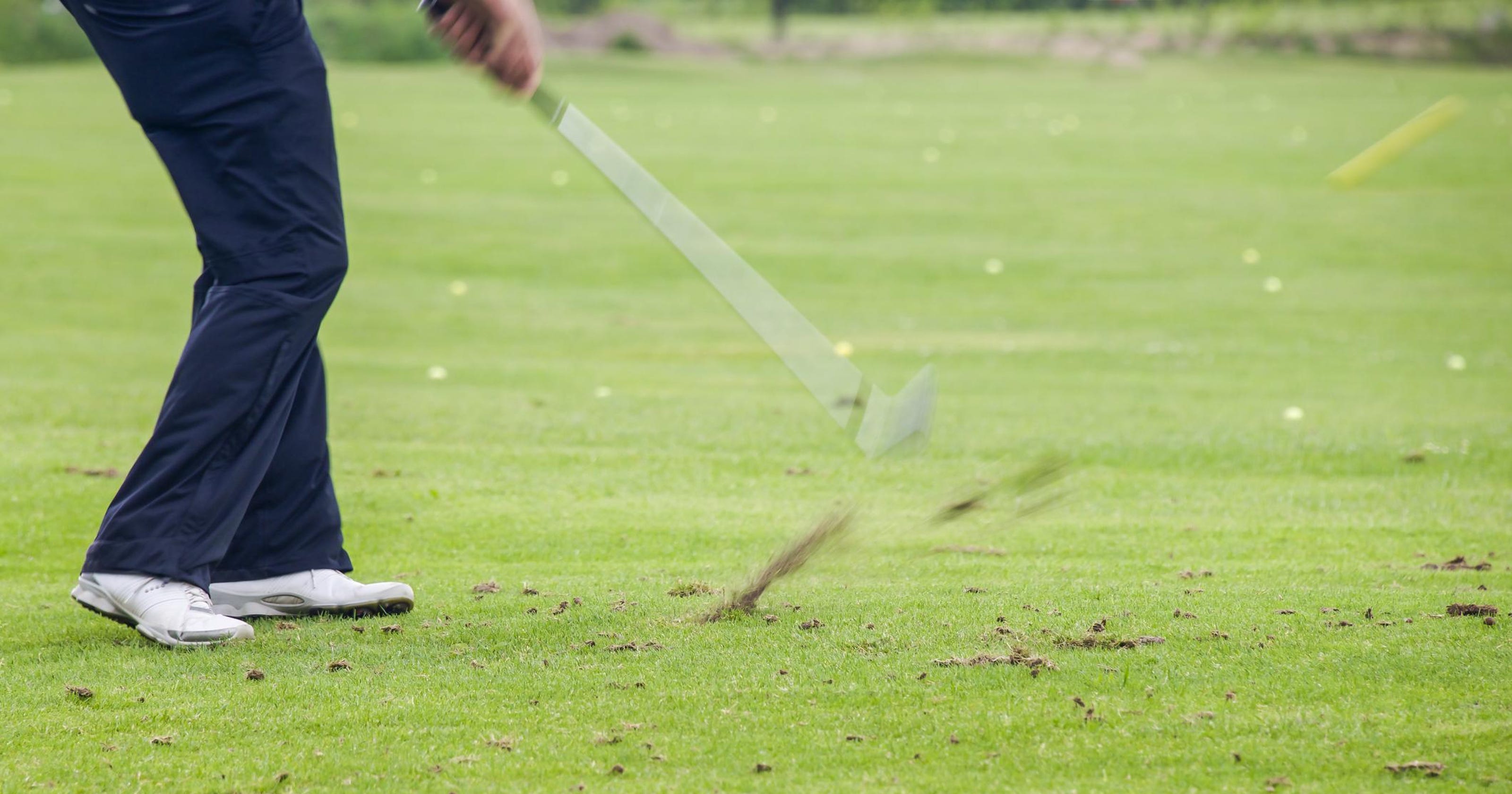 Golf tip Steep downswing leaves big divot behind ball