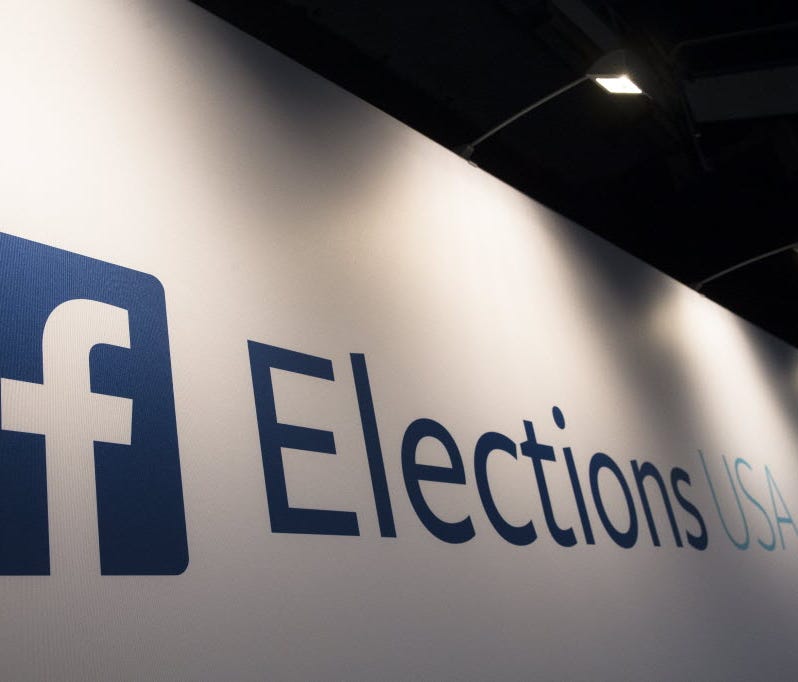 FaceBook Elections signs stand in the media area at Quicken Loans Arena in Cleveland, Thursday, Aug. 6, 2015, before the first Republican presidential debate.