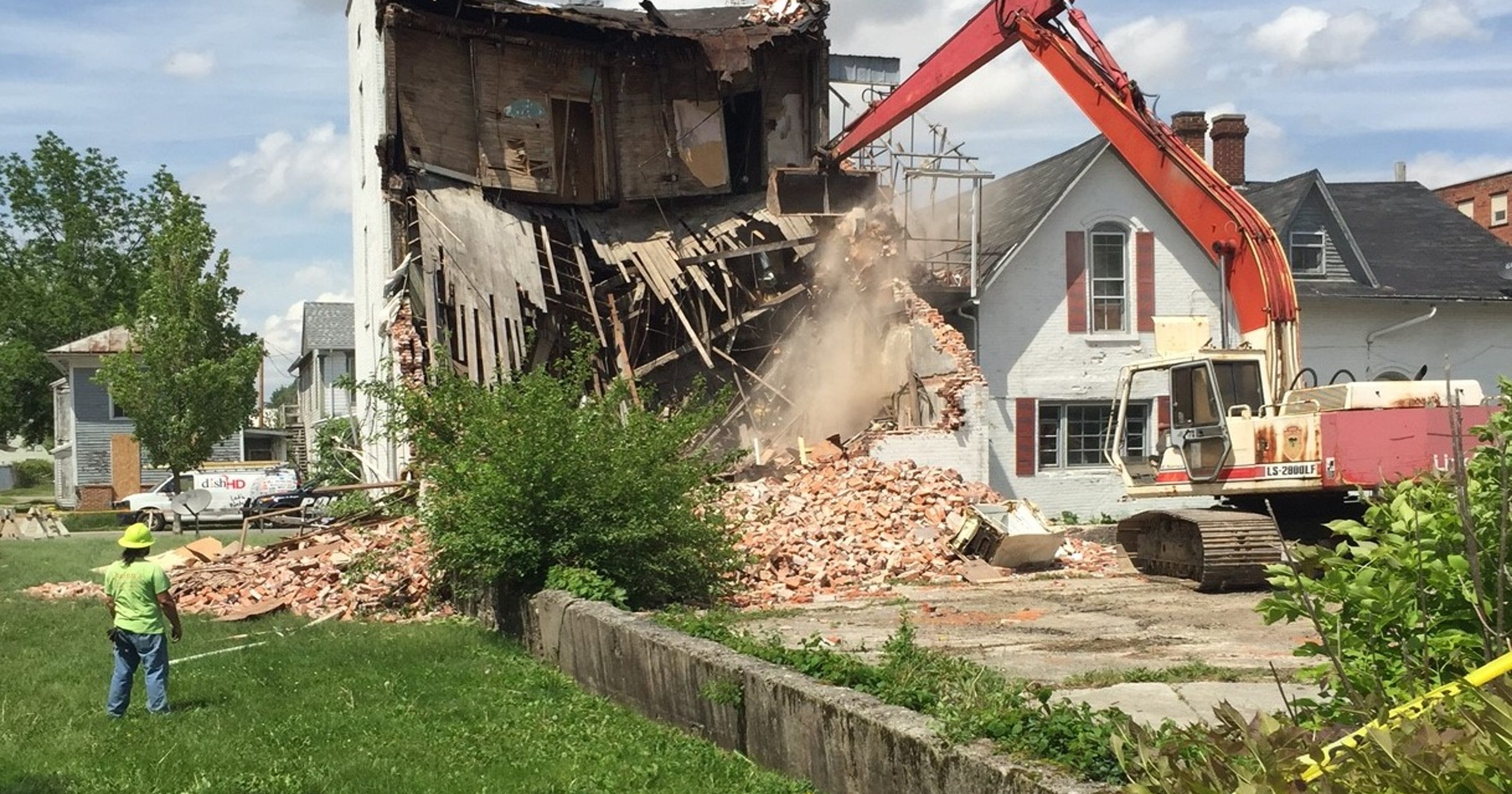 Condemned building comes tumbling down