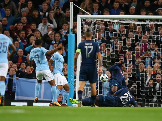 Manchester City's Raheem Sterling, second from left, scores a goal during the Champions League group F soccer match between Manchester City and Napoli at the Etihad Stadium in Manchester, England, Tuesday, Oct.17, 2017. (AP Photo/Dave Thompson)
