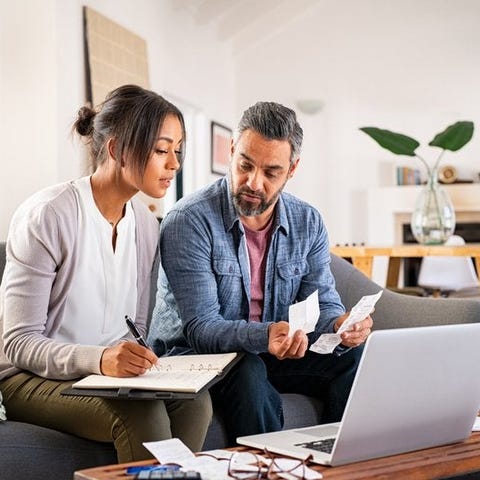 Couple working on taxes.