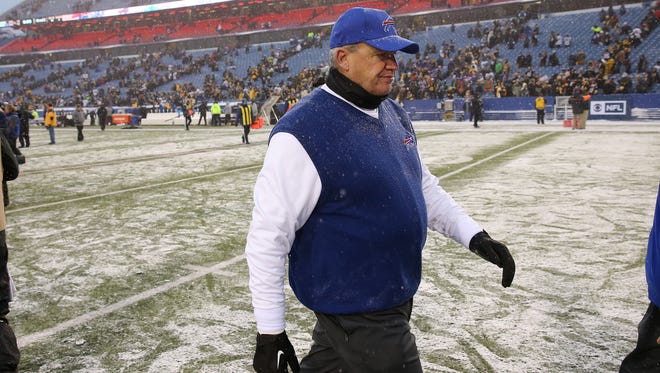 Bills head coach Rex Ryan leaves the field dejected after a 27-20 loss to Pittsburgh on Sunday.