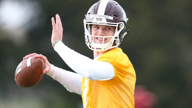 Nick Fitzgerald warms up during a recent spring practice.