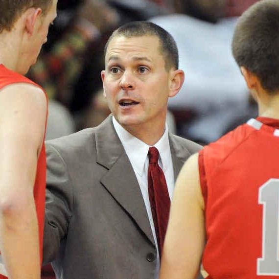 Jarrett Brown talks to his Morton boys basketball players while he was coaching the Potters. Brown resigned last week as Limestone's boys basketball coach.