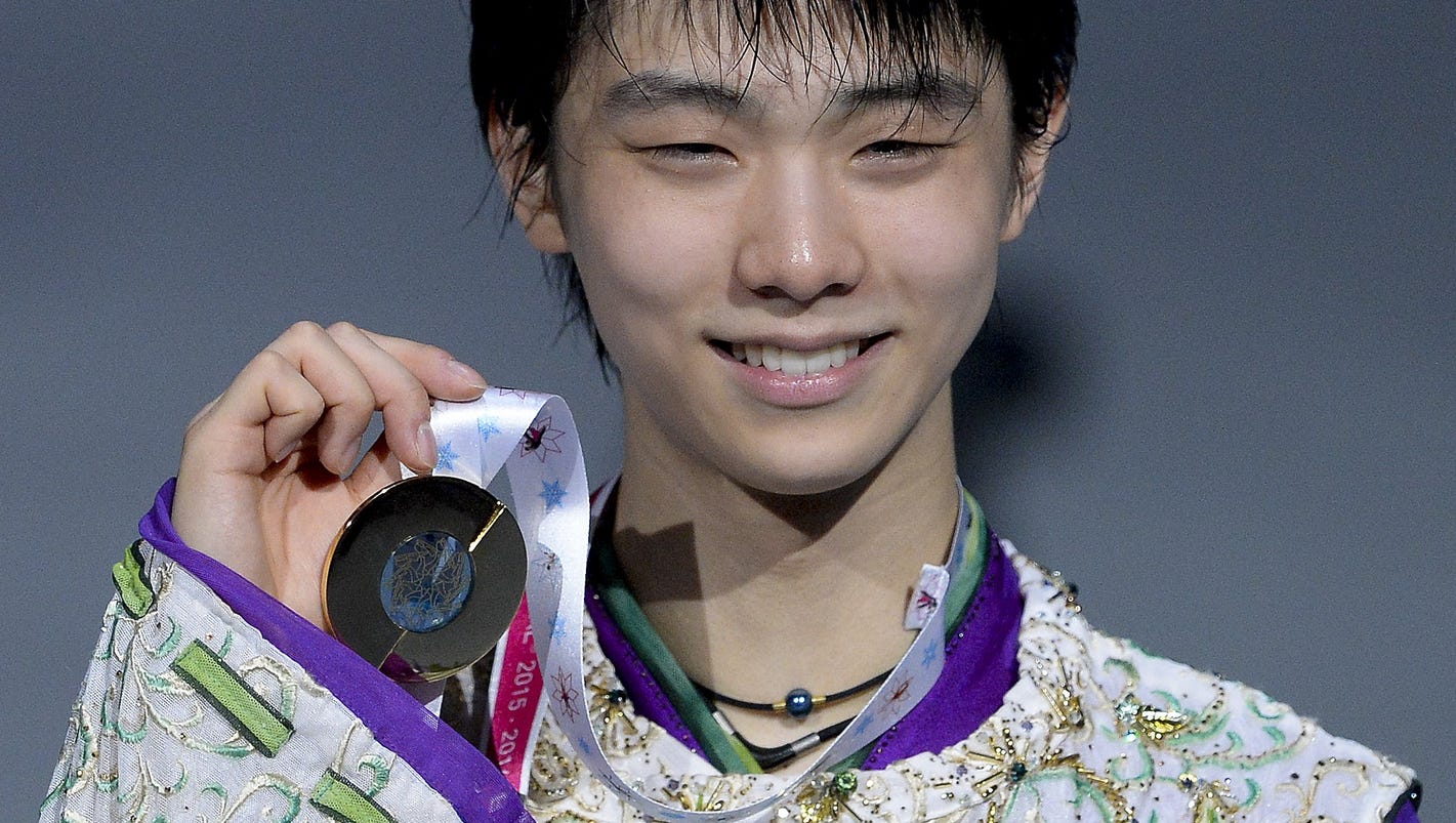 Japan's Yuzuru Hanyu breaks records to win Grand Prix Final