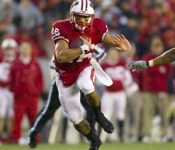Russell Wilson runs the ball against Penn State during his one season at Wisconsin.