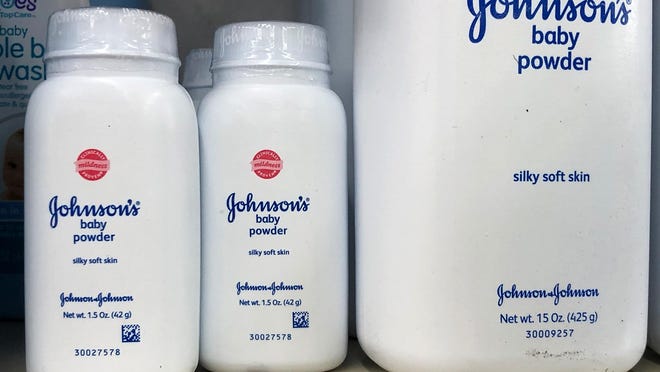 Containers of Johnson's baby powder made by Johnson and Johnson are displayed on a shelf on July 13, 2018 in San Francisco, California. A Missouri jury has ordered pharmaceutical company Johnson and Johnson to pay $4.69 billion in damages to 22 women who claim that they got ovarian cancer from Johnson's baby powder.
