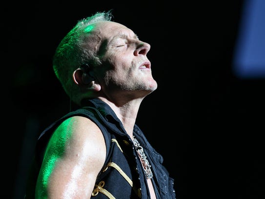 Guitarist Phil Collen of Def Leppard performs at Klipsch Music Center in Noblesville, Ind., Sunday, June 25, 2017.