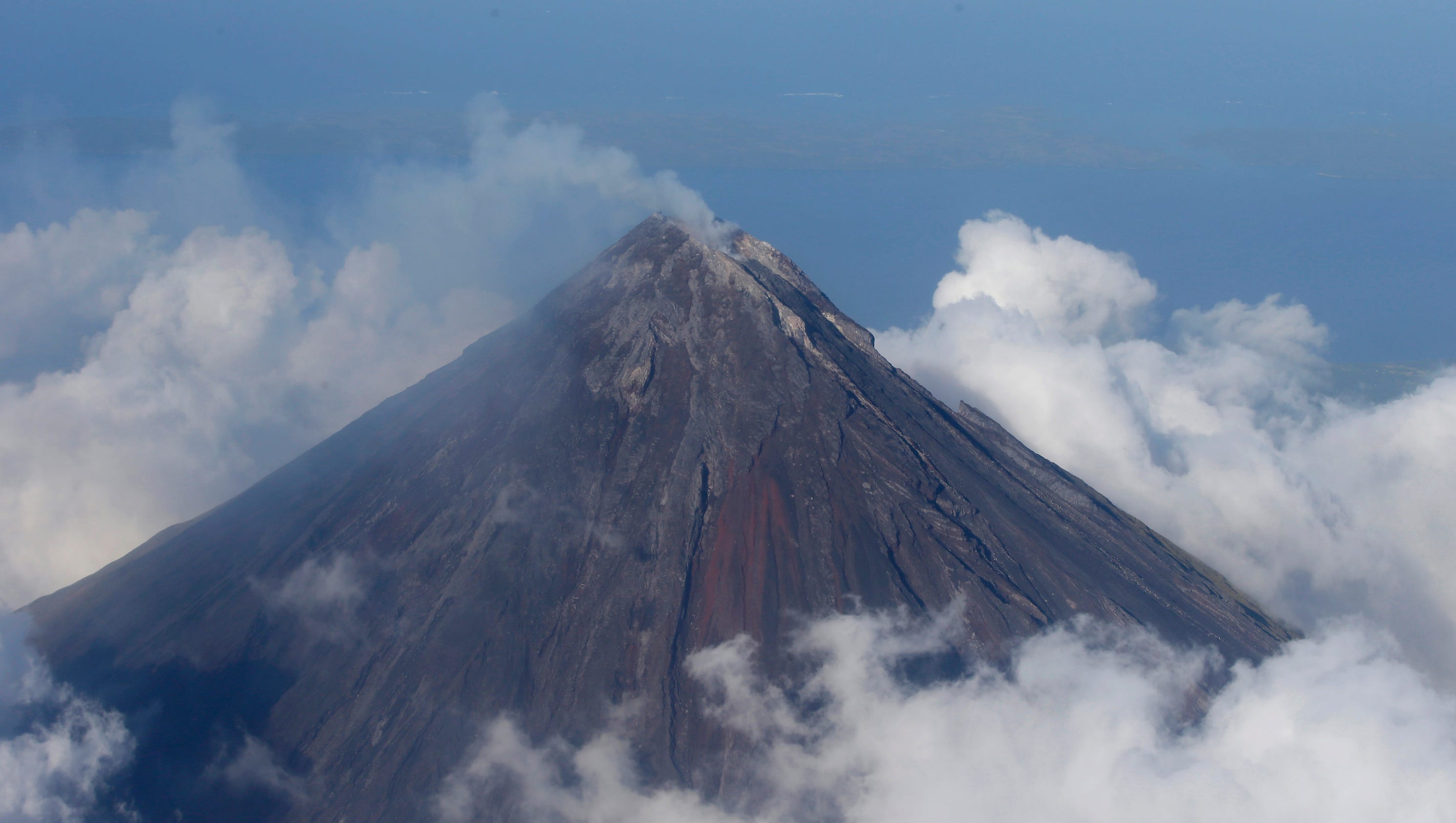 Philippine Volcano Spews Lava Thousands Evacuated