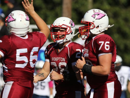 Pompton Lakes junior RB Frank Negrini (middle No. 28) has rushed for 1,434 yards this season.