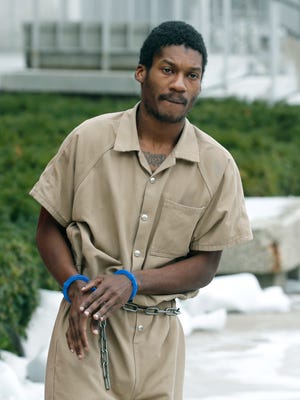 Terror suspect Emanuel Lutchman leaves a federal court appearance in this file photo.