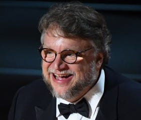 First-time winner Guillermo del Toro accepts the Oscar for best director for 'The Shape of Water.'