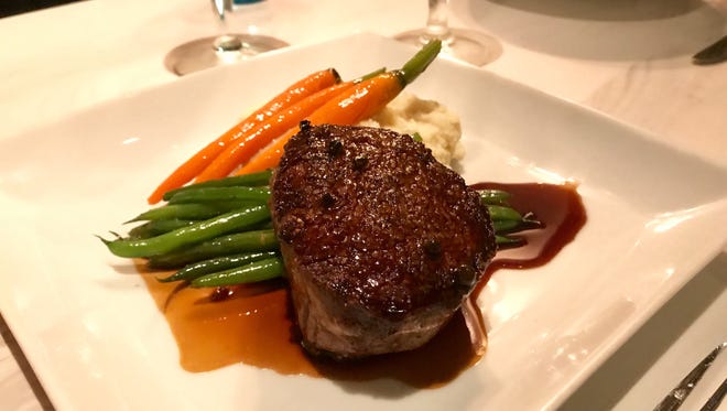 Filet mignon in a green-peppercorn demi from Azure in  south Fort Myers.