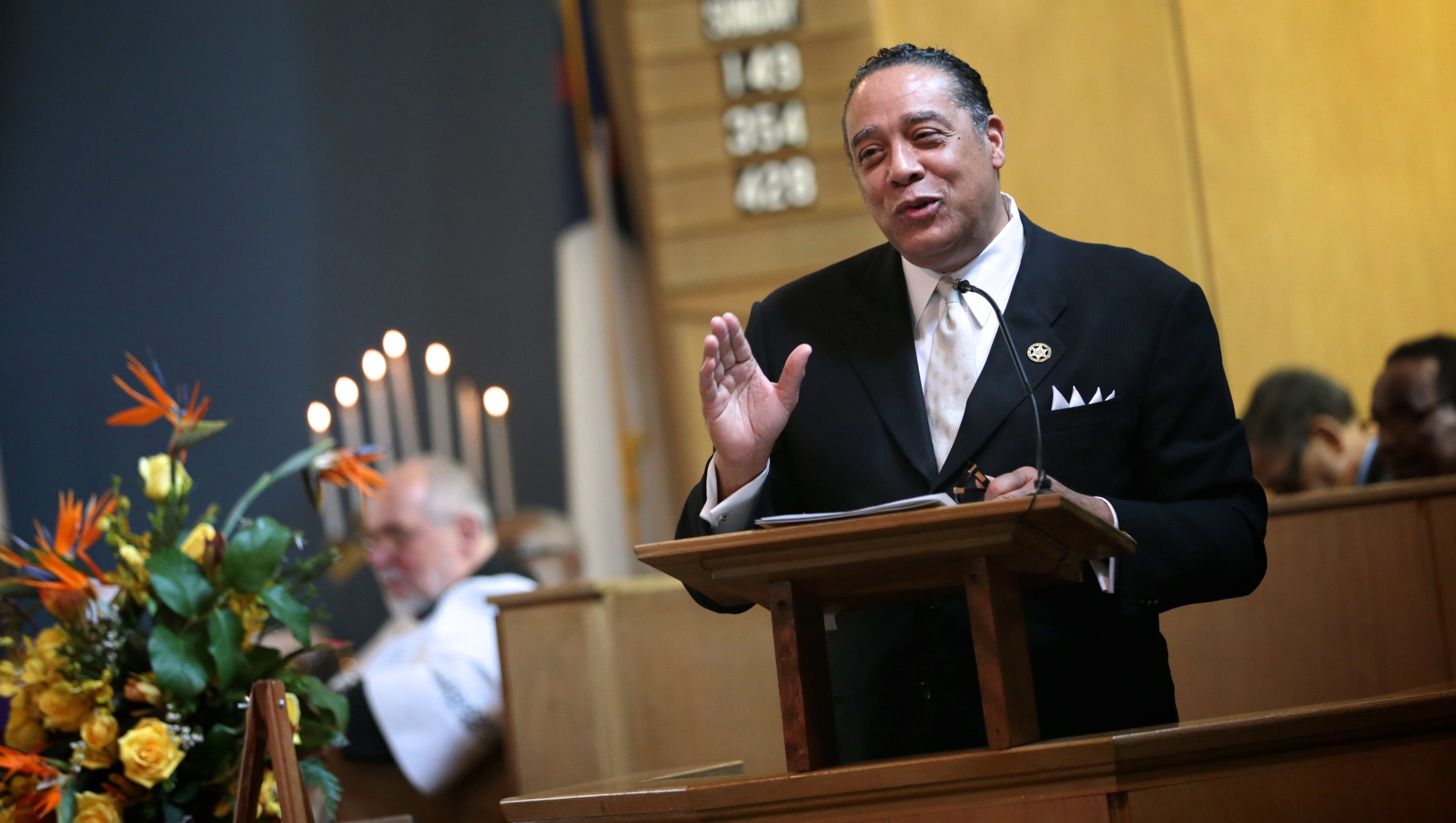 Wayne County Sheriff Benny Napoleon speaks during Gill Hill's funeral service at St. Philip's Evangelical Lutheran Church on Saturday, March 12, 2016, in Detroit.